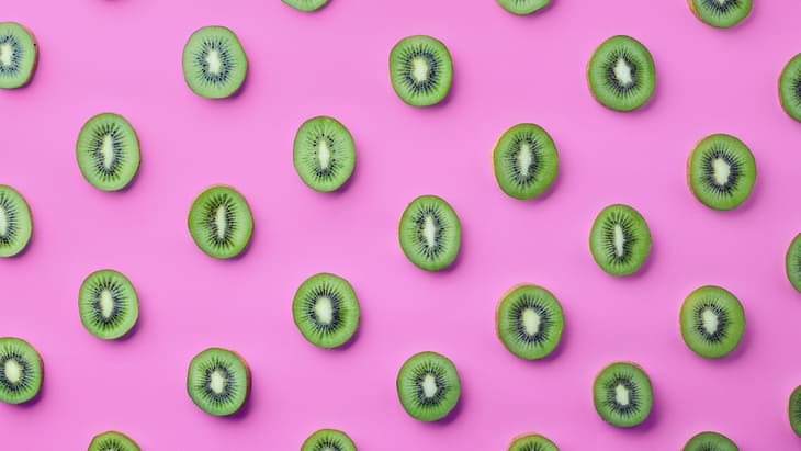 kiwi fruit on pink background
