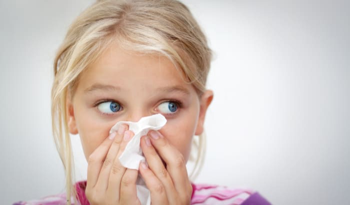 child sneezing