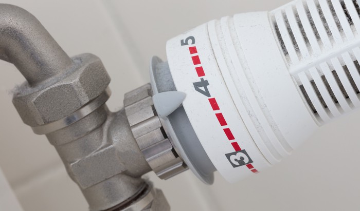 Temperature knob of heating radiator, used and dusty